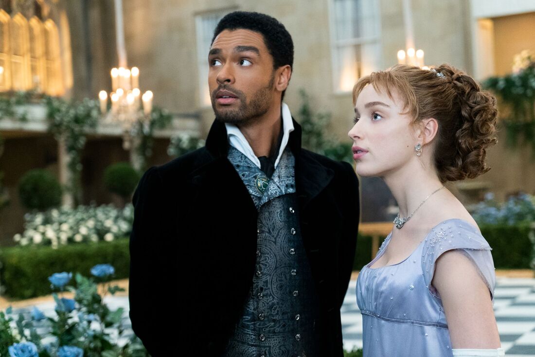 The main love interests in Netflix's Bridgerton, a Black man and a white woman, both of high society, as seen here.