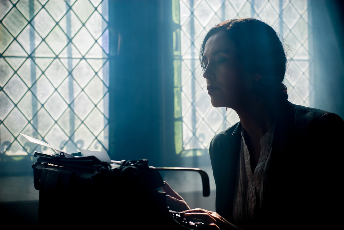 Writer at a typewriter